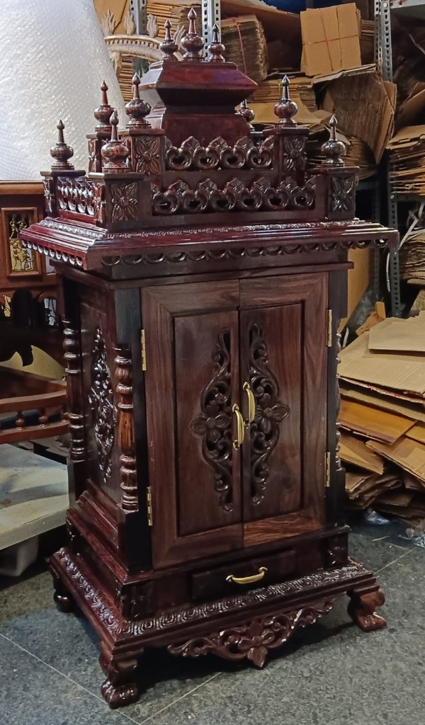 Smaller rosewood temple cabinet with a lattice crown and floral doors