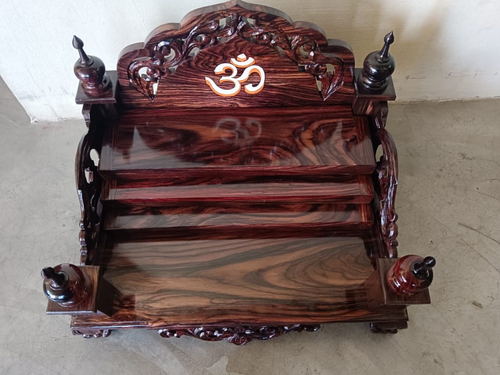 Three-tier rosewood seat with an Om in the crest