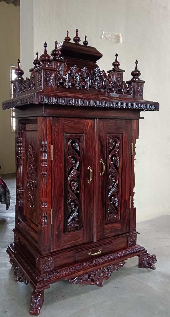 Temple cabinet doors carved in deep relief