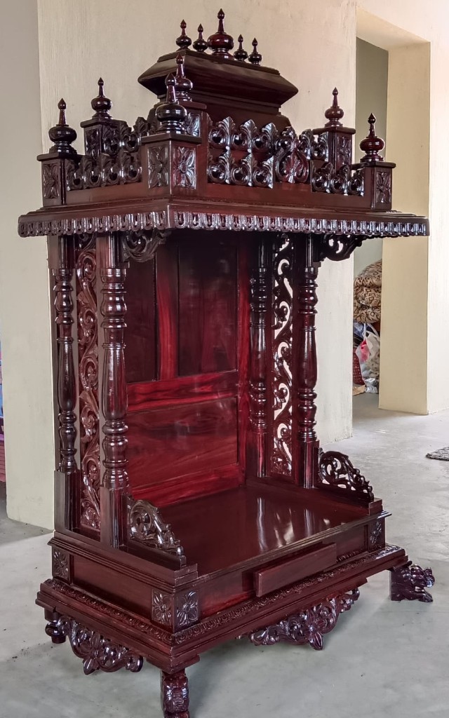 Open Indian rosewood mantapa with a pierced crown and scroll-carved brackets